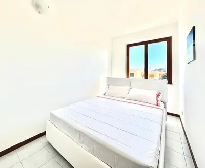 Letto o letti in una camera di Casa Proserpio