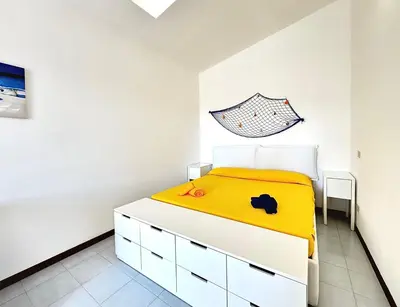 Letto o letti in una camera di Casa Proserpio