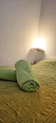 Letto o letti in una camera di Casa Carboni
