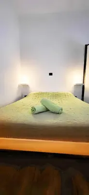 Letto o letti in una camera di Casa Carboni