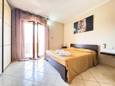 Letto o letti in una camera di Angolo di Relax