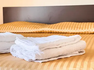 Letto o letti in una camera di Angolo di Relax