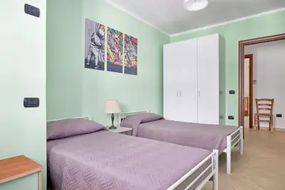 Letto o letti in una camera di Ogliastra Blue - A un soffio dal mare