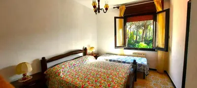 Letto o letti in una camera di Villa Spiga