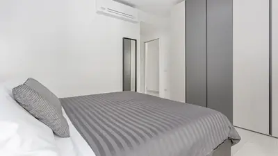 Letto o letti in una camera di Domo Wai