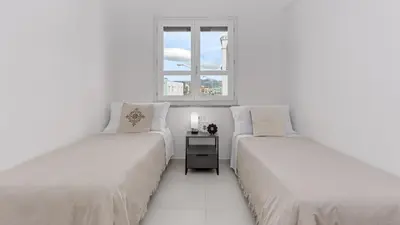 Letto o letti in una camera di Domo Wai