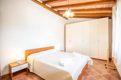Letto o letti in una camera di Villetta Is Carcuris