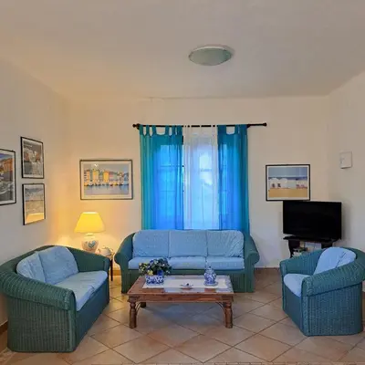 TV o dispositivi per l'intrattenimento presso Villa Pina 100 meters from the sea