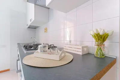Cucina o angolo cottura di Casa Suite Himalaya Estate in Sardegna Vicino al Mare e Aeroporto Wi-Fi & Parcheggio