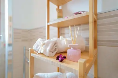 Letto o letti in una camera di Casa Suite Himalaya Estate in Sardegna Vicino al Mare e Aeroporto Wi-Fi & Parcheggio