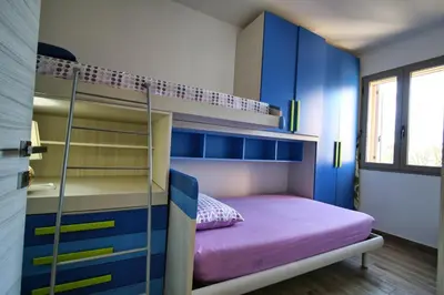 Letto o letti in una camera di Casa di Marilyn