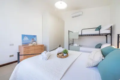 Letto o letti in una camera di Casa Valsimon immersa nel verde