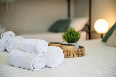 Letto o letti in una camera di Casa Valsimon immersa nel verde