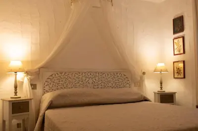 Letto o letti in una camera di EMILIA'S HOUSE in Feraxi - Muravera