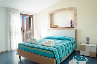 Letto o letti in una camera di Monica's Guesthouse