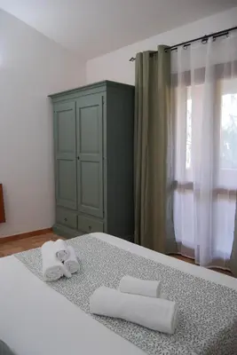Letto o letti in una camera di Villa Ines Casa Vacanze