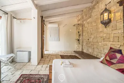 Letto o letti in una camera di Villa Barbagallo