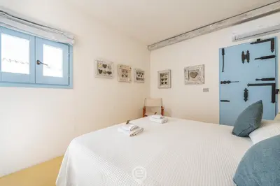 Letto o letti in una camera di Villa Barbagallo
