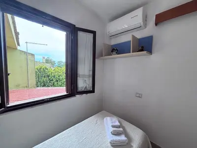 Letto o letti in una camera di Eden Villa with garden, Capitana, Sardegna