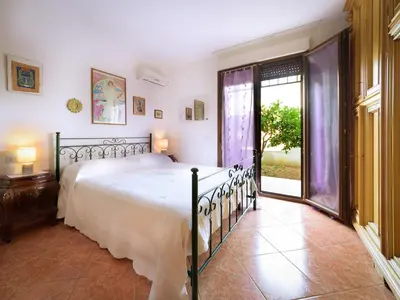 Letto o letti in una camera di Da Assunta