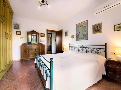 Letto o letti in una camera di Da Assunta