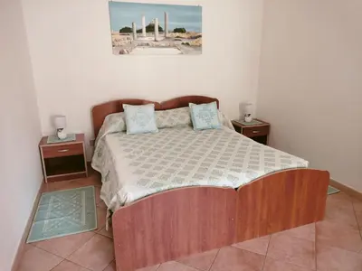 Letto o letti in una camera di Casa Giuliana