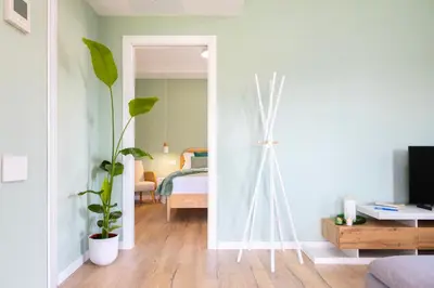 Letto o letti in una camera di Chapelle Nove - Green Apartment