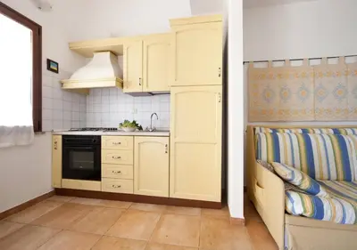 Cucina o angolo cottura di Villa Domo Sardo - Masone pardu