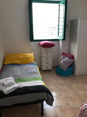 Letto o letti in una camera di Casetta Storica Sotto Torre