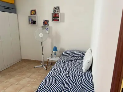 Letto o letti in una camera di Casetta Storica Sotto Torre