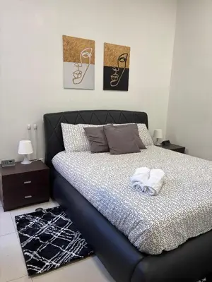 Letto o letti in una camera di Suite Grazia Cagliari