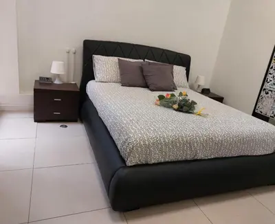 Letto o letti in una camera di Suite Grazia Cagliari