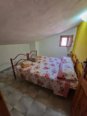 Letto o letti in una camera di La casa dei Nonni