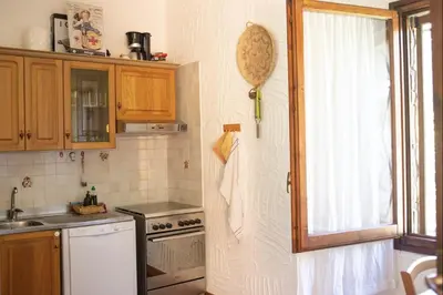 Cucina o angolo cottura di Beach House 100 meters from the sea