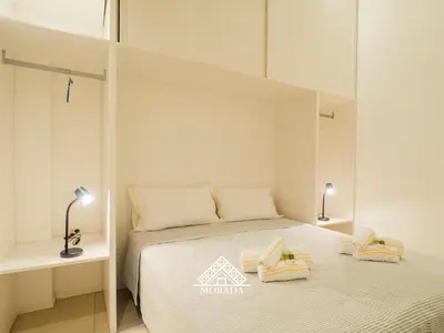Letto o letti in una camera di Giardini 62 - MORADA