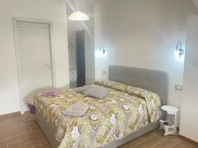 Letto o letti in una camera di Angela