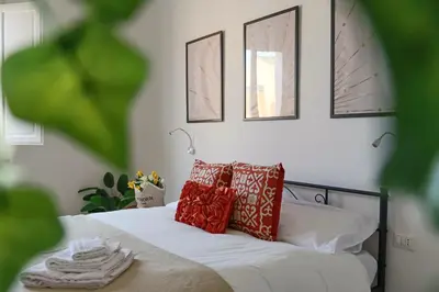 Letto o letti in una camera di Residenza Lucano - Appartamento Red