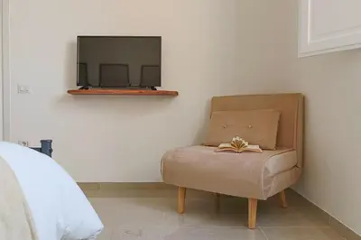 TV o dispositivi per l'intrattenimento presso Residenza Lucano - Appartamento Red
