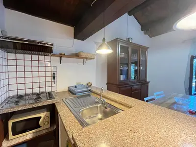 Cucina o angolo cottura di Il Gatto di Monte Attu