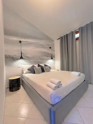 Letto o letti in una camera di Villa Silvana - Grandview Costa Rei