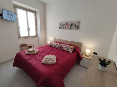 Letto o letti in una camera di Fontana Ghibellina