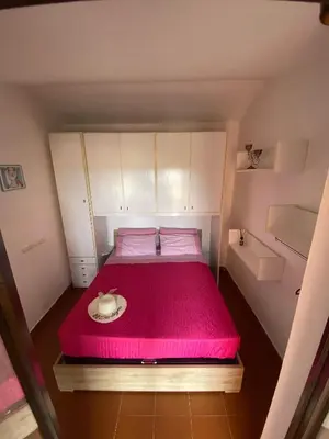 Letto o letti in una camera di Casa Laconi