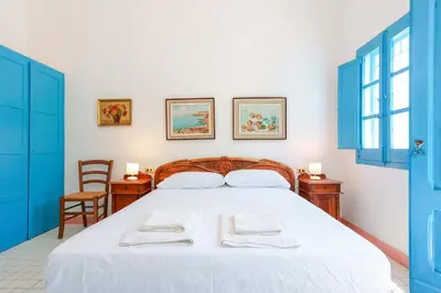 Letto o letti in una camera di Agriturismo Costa del Sud