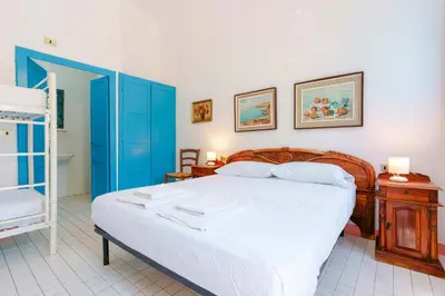 Letto o letti in una camera di Agriturismo Costa del Sud