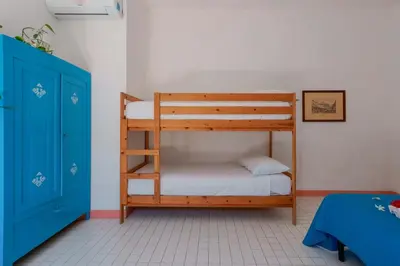 Letto o letti in una camera di Agriturismo Costa del Sud