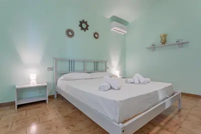 Letto o letti in una camera di Villa Alba Ogliastra con piscina privata