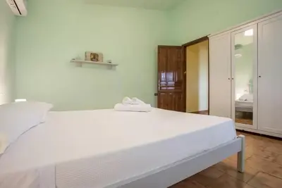 Letto o letti in una camera di Villa Alba Ogliastra con piscina privata