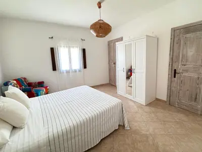 Letto o letti in una camera di Casa Storica