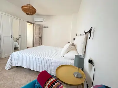 Letto o letti in una camera di Casa Storica