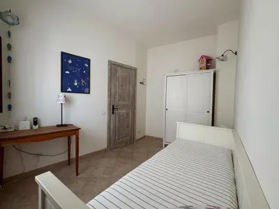 Letto o letti in una camera di Casa Storica